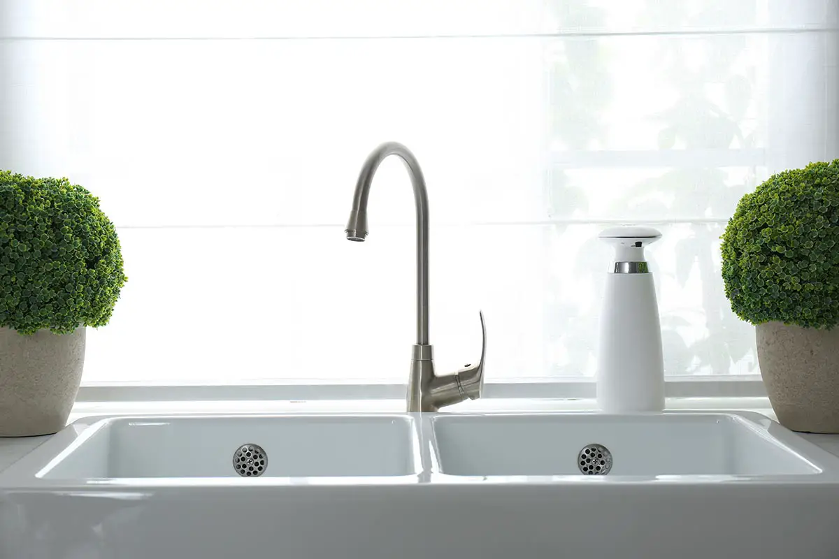 unclog standing water in kitchen sink