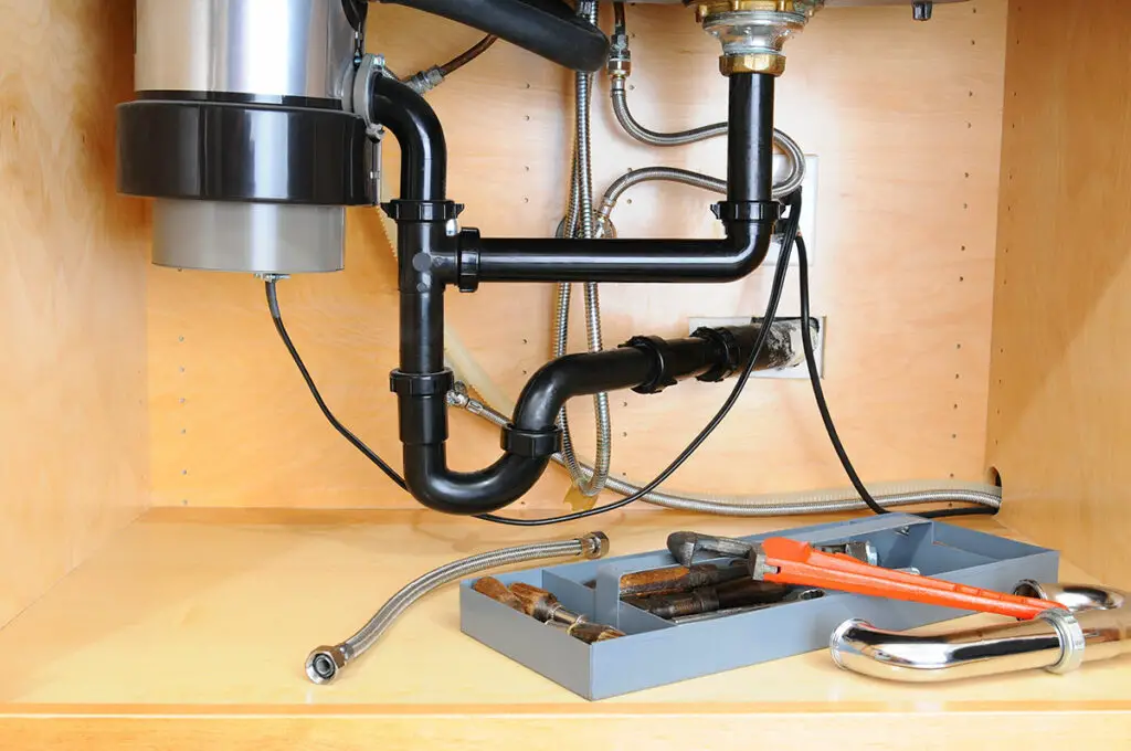 plumbing a double kitchen sink with garbage disposal